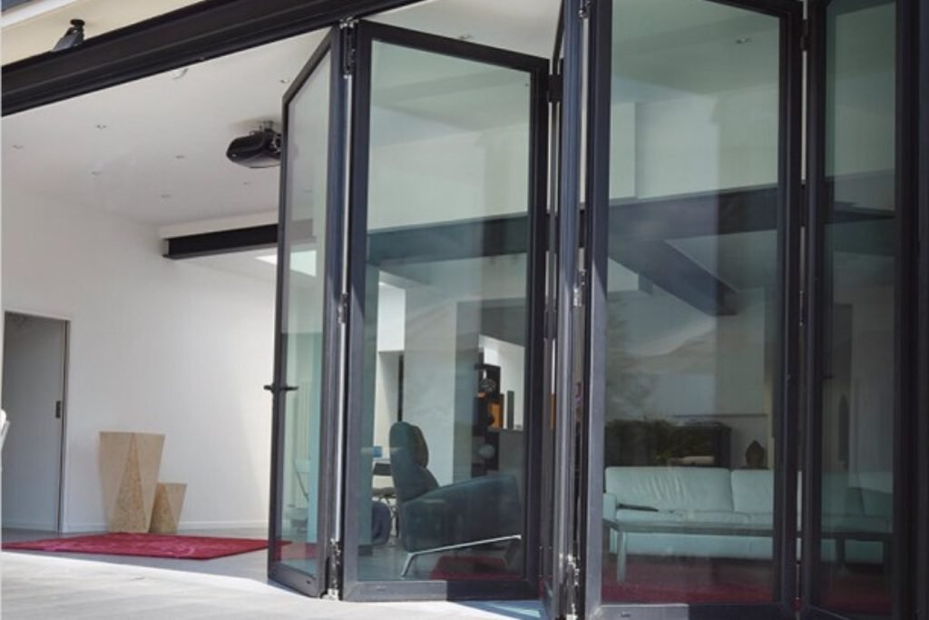 Interior folding door – stylish and functional design for creating open spaces.